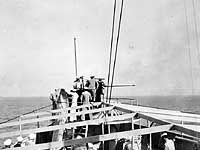 Photo # NH 99611:  Gunnery practice on board USS Aroostook, circa the later 1920s